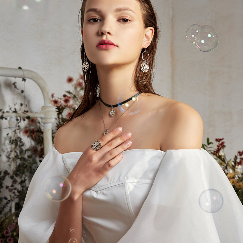 Sea Pianist Hollow Circular Zircon Earrings