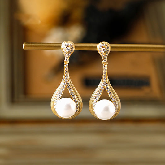 Louvre Shadow Water Drop Hollow Earrings